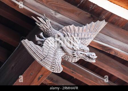 Giappone, Kyushu, Fukuoka, Hakata. Kushida Shinto Shrine Roof Guardian. Foto Stock