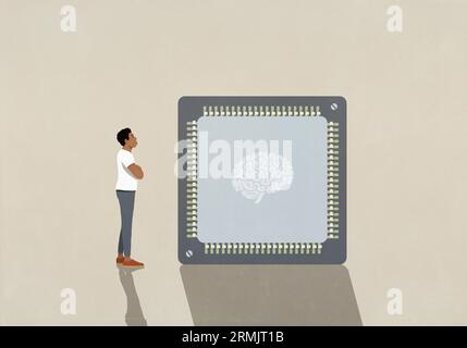 Uomo che fissa un grande microchip cerebrale ai Foto Stock