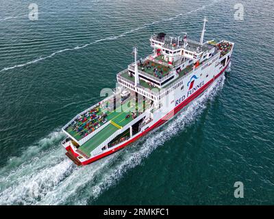 Aerial view of Red Funnel Ferries' Red Eagle underway on a crossing between Cowes on the Isle of Wight and Southampton. Stock Photo