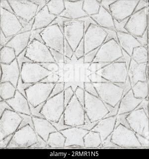 Ornamento islamico tradizionale geometrico. Frammento di mosaico scolpito su marmo bianco. Sfondo astratto. Foto Stock