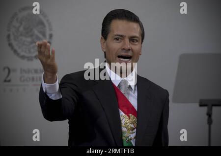 (140902) -- CITTÀ DEL MESSICO, 2 settembre 2014 -- il presidente messicano Enrique pena Nieto presenta il suo secondo rapporto annuale alla nazione a città del Messico, capitale del Messico, il 2 settembre 2014. ) MESSICO-CITTÀ DEL MESSICO-NIETO-RAPPORTO ANNUALE AlejandroxAyala PUBLICATIONxNOTxINxCHN città del Messico 2 settembre 2014 il presidente MESSICANO Enrique pena Nieto presenta il suo secondo rapporto annuale alla nazione di città del Messico capitale del Messico IL 2 settembre 2014 città del Messico Nieto rapporto annuale PUBLICATIONxNOTxINxCHN Foto Stock