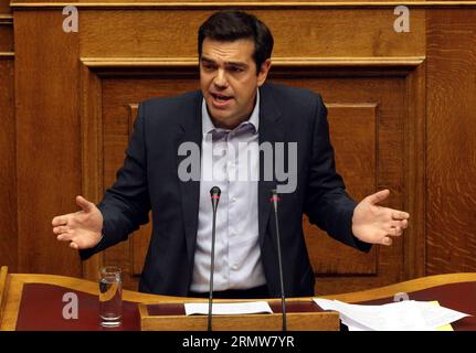 Il leader della principale opposizione partito di sinistra radicale SYRIZA Alexis Tsipras parla al parlamento di Atene 10 ottobre 2014. Il governo di coalizione greco ha vinto un rinnovato voto di fiducia all'inizio di sabato, evitando lo scenario di elezioni rapide. ) (Zjy) GRECIA-ATENE-POLITICA-VOTO MariosxLolos PUBLICATIONxNOTxINxCHN leader della sinistra radicale principale opposizione Partito Syriza Alexis Tsipras parla AL Parlamento di Atene 10 ottobre 2014 il governo greco di coalizione ha vinto un nuovo VOTO di fiducia all'inizio di sabato scongiurando lo scenario delle elezioni Snap Grecia Atene VOTO POLITICO MariosxLolos PUBBLICAZIONE Foto Stock