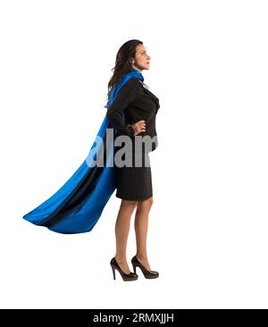 una donna d'affari con un mantello si comporta come un supereroe Foto Stock