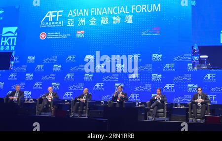 (150119) -- HONG KONG, 19 gennaio 2015 -- Chan Tak-Lam(3rd R), amministratore delegato della Hong Kong Monetary Authority (HKMA) parla durante l'Asian Financial Forum 2015 a Hong Kong, nel sud della Cina, 19 gennaio 2015. ) (wyo) CHINA-HONG KONG-ASIAN FINANCIAL FORUM (CN) LuixSiuxWai PUBLICATIONxNOTxINxCHN Hong Kong 19 gennaio 2015 Chan Tak LAM 3rd r Chief Executive of Hong Kong Monetary Authority HKMA parla durante l'Asian Financial Forum 2015 di Hong Kong South China 19 gennaio 2015 China Hong Kong Asian Financial Forum CN PUBLICATIONxTxINxCHN Foto Stock