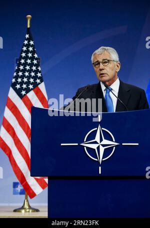 (150205) -- BRUXELLES, 5 febbraio 2015 -- il segretario alla difesa statunitense Chuck Hagel interviene durante una conferenza stampa presso la sede della NATO a Bruxelles, capitale del Belgio, 5 febbraio 2014. I ministri della difesa della NATO si sono riuniti qui giovedì per discutere l'attuazione del piano d'azione per la preparazione e la crisi Ucraina. Zhou lei) BELGIO-NATO-USA-CHUCK HAGEL? PUBLICATIONxNOTxINxCHN Bruxelles 5 febbraio 2015 il Segretario della difesa degli Stati Uniti Chuck Hagel parla durante una conferenza stampa PRESSO la sede della NATO a Bruxelles capitale del Belgio 5 febbraio 2014 il Ministro della difesa della NATO si è riunito qui giovedì per discutere dei simpatizzanti Foto Stock