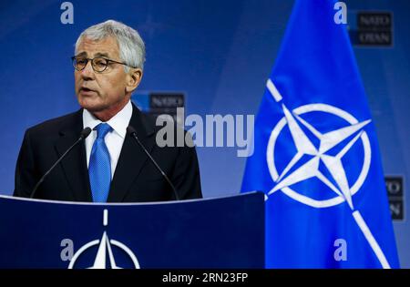 (150205) -- BRUXELLES, 5 febbraio 2015 -- il segretario alla difesa statunitense Chuck Hagel interviene durante una conferenza stampa presso la sede della NATO a Bruxelles, capitale del Belgio, 5 febbraio 2014. I ministri della difesa della NATO si sono riuniti qui giovedì per discutere l'attuazione del piano d'azione per la preparazione e la crisi Ucraina. Zhou lei) BELGIO-NATO-USA-CHUCK HAGEL? PUBLICATIONxNOTxINxCHN Bruxelles 5 febbraio 2015 il Segretario della difesa degli Stati Uniti Chuck Hagel parla durante una conferenza stampa PRESSO la sede della NATO a Bruxelles capitale del Belgio 5 febbraio 2014 il Ministro della difesa della NATO si è riunito qui giovedì per discutere dei simpatizzanti Foto Stock