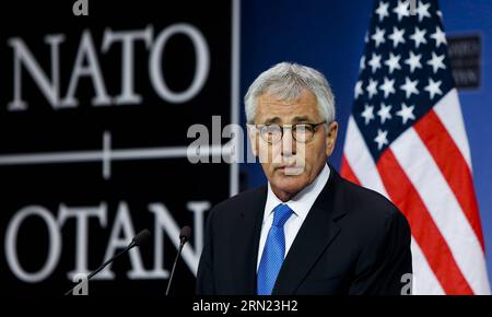 (150205) -- BRUXELLES, 5 febbraio 2015 -- il segretario alla difesa statunitense Chuck Hagel interviene durante una conferenza stampa presso la sede della NATO a Bruxelles, capitale del Belgio, 5 febbraio 2014. I ministri della difesa della NATO si sono riuniti qui giovedì per discutere l'attuazione del piano d'azione per la preparazione e la crisi Ucraina. Zhou lei) BELGIO-NATO-USA-CHUCK HAGEL? PUBLICATIONxNOTxINxCHN Bruxelles 5 febbraio 2015 il Segretario della difesa degli Stati Uniti Chuck Hagel parla durante una conferenza stampa PRESSO la sede della NATO a Bruxelles capitale del Belgio 5 febbraio 2014 il Ministro della difesa della NATO si è riunito qui giovedì per discutere dei simpatizzanti Foto Stock