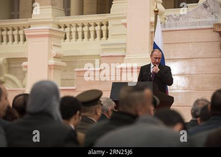 (150210) -- CAIRO, 10 febbraio 2015 -- il presidente russo in visita Vladimir Putin partecipa a una conferenza stampa congiunta dopo l'incontro con il presidente egiziano Abdel-Fattah al-Sisi al Palazzo Koba, il Cairo, Egitto, il 10 febbraio 2015. Il presidente egiziano Abdel-Fattah al-Sisi e il suo omologo russo in visita Vladimir Putin hanno concordato martedì di costruire una centrale nucleare nella città di Dabaa, nella provincia costiera di Matrouh in Egitto. ) EGITTO-CAIRO-RUSSIA-PUTIN-CENTRALE NUCLEARE PanxChaoyue PUBLICATIONxNOTxINxCHN Cairo 10 febbraio 2015 il presidente russo in visita Vladimir Putin partecipa a una conferenza stampa congiunta Foto Stock