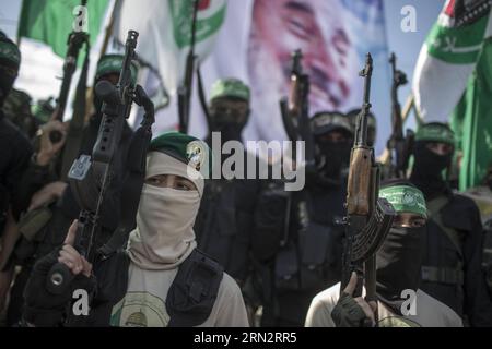 (150322) -- GAZA, 22 marzo 2015 -- militanti palestinesi di Hamas partecipano a una sfilata per celebrare l'undicesimo anniversario dell'assassinio israeliano del leader spirituale di Hamas, Sheikh Ahmed Yassin, nella città di Gaza, il 22 marzo 2015. ) MIDEAST-GAZA-MILITARY-PARADE-ANNIVERSARY-YASSIN WissamxNassar PUBLICATIONxNOTxINxCHN Gaza 22 marzo 2015 militante PALESTINESE di Hamas partecipa a una parata per celebrare l'undicesimo anniversario dell'assassinio israeliano del leader spirituale Hamas Sheikh Ahmed Yassin nella città di Gaza IL 22 marzo 2015 anniversario della parata militare Mideast Gaza Yassin WissamxNassar PUBLINTIN Foto Stock