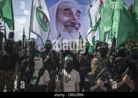 (150322) -- GAZA, 22 marzo 2015 -- militanti palestinesi di Hamas partecipano a una sfilata per celebrare l'undicesimo anniversario dell'assassinio israeliano del leader spirituale di Hamas, Sheikh Ahmed Yassin, nella città di Gaza, il 22 marzo 2015. ) MIDEAST-GAZA-MILITARY-PARADE-ANNIVERSARY-YASSIN WissamxNassar PUBLICATIONxNOTxINxCHN Gaza 22 marzo 2015 militante PALESTINESE di Hamas partecipa a una parata per celebrare l'undicesimo anniversario dell'assassinio israeliano del leader spirituale Hamas Sheikh Ahmed Yassin nella città di Gaza IL 22 marzo 2015 anniversario della parata militare Mideast Gaza Yassin WissamxNassar PUBLINTIN Foto Stock