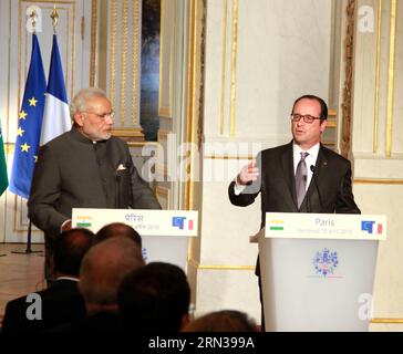 (150410) -- PARIGI, 10 aprile 2015 -- il presidente francese Francois Hollande(R) e il primo ministro indiano in visita Narendra modi partecipano alla conferenza stampa a Parigi, in Francia, il 10 aprile 2015. L'India comprerà 36 aerei da combattimento Rafale dalla Francia, il primo ministro indiano Narendra modi ha annunciato venerdì il suo primo giorno di visita in Francia. ) FRANCE-PARIS-INDIA-RAFALE FIGHTER JETS ZhengxBin PUBLICATIONxNOTxINxCHN Parigi 10 aprile 2015 il presidente francese Francois Hollande r e i primi ministri indiani in visita Narendra Modes partecipano alla conferenza stampa a Parigi in Francia IL 10 aprile 2015 India acquisterà 36 Rafale Foto Stock