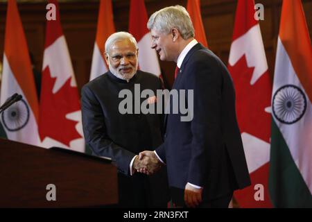 (150415) -- OTTAWA, 15 aprile 2015 -- il primo ministro canadese Stephen Harper(R) stringe la mano al primo ministro indiano Narendra modi a seguito di una conferenza stampa congiunta tenutasi a Parliament Hill a Ottawa, Canada, il 15 aprile 2015. ) CANADA-OTTAWA-PM-MEETING DavidxKawai PUBLICATIONxNOTxINxCHN Ottawa 15 aprile 2015 i primi ministri canadesi Stephen Harper r Shakes Hands with Indian prime Minister Narendra Modes dopo una conferenza stampa congiunta TENUTASI A Parliament Hill a Ottawa Canada IL 15 aprile 2015 Canada Ottawa PM Meeting PUBLICATIONxNOTxINxCHN Foto Stock