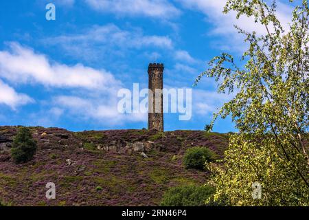 Peel Tower was built in 1852 to commemorate Sir Robert Peel a local polititician. It stands on Holcombe Hill and overlooks the village of Holcombe and Stock Photo