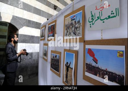 (150530) -- DAMASCO, 30 maggio 2015 -- i siriani partecipano a una fiera d'arte sui movimenti di resistenza tenutasi presso il Khan come sede ad Pasha a Damasco, Siria, 30 maggio 2015. ) SIRIA-DAMASCO-ART FAIR Ammar PUBLICATIONxNOTxINxCHN 150530 Damasco maggio 30 2015 i siriani partecipano alla Art Fair About Resistance Movements Hero AT the Khan as Pascià Venue in pensione a Damasco Siria maggio 30 2015 Siria Damasco Art Fair Ammar PUBLICATIONxNOTxINxCHN Foto Stock