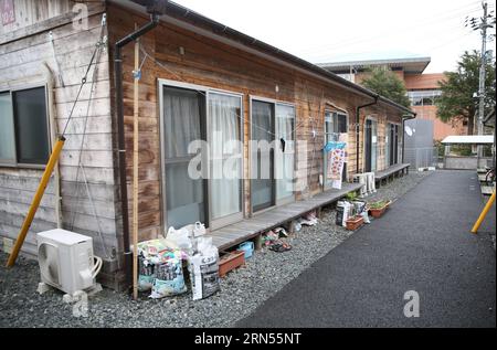 TOKYO, 2015 -- in questa foto scattata l'8 marzo 2015, case temporanee per le vittime dello tsunami sono viste nella città di Minamisoma nella prefettura di Fukushima, in Giappone. La ricostruzione delle regioni del Giappone nordorientale, colpite quattro anni fa da un devastante terremoto e dallo tsunami che ne seguì, rimane lenta. ) (zw) GIAPPONE-TSUNAMI-RICOSTRUZIONE LiuxTian PUBLICATIONxNOTxINxCHN Tokyo 2015 in questo file foto scattata L'8 marzo 2015 Case temporanee per le vittime dello Tsunami sono i laghi nella città di Minamisoma nella prefettura di Fukushima Giappone ricostruzione delle regioni nel Giappone nord-orientale che sono stati colpiti quattro Yea Foto Stock
