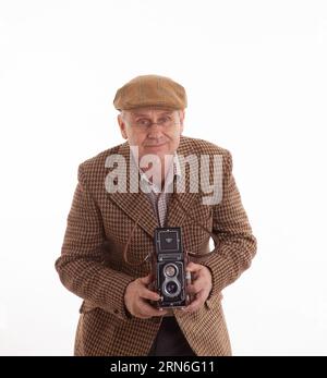 Un fotografo inglese maturo nel classico tweeds Foto Stock