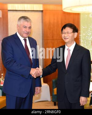 (151023) -- BEIJING, Oct. 23, 2015 -- Meng Jianzhu (R), head of the Commission for Political and Legal Affairs of the Communist Party of China Central Committee, meets with Russian Interior Minister Vladimir Kolokoltsev attending the China-ASEAN Ministerial Dialogue on Law Enforcement and Security Cooperation, in Beijing, capital of China, Oct. 23, 2015. )(mcg) CHINA-BEIJING-MENG JIANZHU-FOREIGN OFFICIALS-MEETING (CN) ZhangxLing PUBLICATIONxNOTxINxCHN   Beijing OCT 23 2015 Meng Jianzhu r Head of The Commission for Political and legal Affairs of The Communist Party of China Central Committee Me Foto Stock