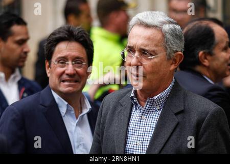 (151025) -- BOGOTA, Oct. 25, 2015 -- Former Colombian President Alvaro Uribe (R) and candidate for the mayoralty of Bogota Francisco Santos arrive at a polling station to cast their votes during the regional elections in Bogota, Colombia, on Oct. 25, 2015. The regional elections are carried out on Sunday where citizens elect governors, deputies of departmental assemblies, mayors, and municipal councillors of the local administrative boards. Jhon Paz) (jp) (fnc) COLOMBIA-BOGOTA-REGIONAL ELECTIONS e Jhonpaz PUBLICATIONxNOTxINxCHN   Bogota OCT 25 2015 Former Colombian President Alvaro Uribe r and Stock Photo