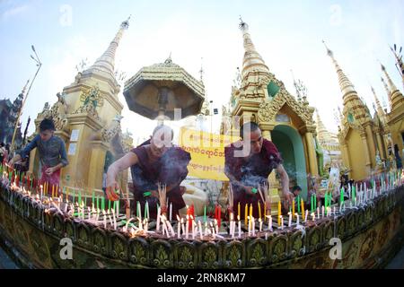 (151028) -- YANGON, Oct. 28, 2015 -- Myanmar Buddhist monks light candles on Myanmar s traditional Thadingyut lantern festival at the Shwedagon Pagoda in Yangon, Myanmar, on Oct. 28, 2015. The Thadingyut lantern festival is held on the full moon day of the Burmese Lunar month of Thadingyut. )(zhf) MYANMAR-YANG0N-THADINGYUT FESTIVAL UxAung PUBLICATIONxNOTxINxCHN   Yangon OCT 28 2015 Myanmar Buddhist Monks Light Candles ON Myanmar S Traditional  Lantern Festival AT The Shwedagon Pagoda in Yangon Myanmar ON OCT 28 2015 The  Lantern Festival IS Hero ON The Full Moon Day of The Burmese Lunar Month Stock Photo