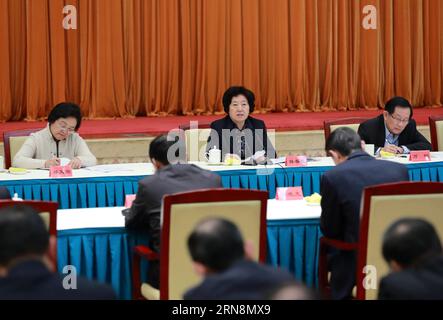 (151030) -- BEIJING, Oct. 30, 2013 -- Sun Chunlan (C rear), member of the Political Bureau of the Communist Party of China (CPC) Central Committee and head of the United Front Work Department of the CPC Central Committee, speaks during a briefing on the Fifth Plenary Session of the 18th CPC Central Committee to non-CPC representatives in Beijing, capital of China, Oct. 30, 2015. ) (wjq) CHINA-BEIJING-18TH CPC CENTRAL COMMITTEE-FIFTH PLENARY SESSION-BRIEFING (CN) DingxHaitao PUBLICATIONxNOTxINxCHN   Beijing OCT 30 2013 Sun Chunlan C Rear member of The Political Bureau of The Communist Party of Stock Photo