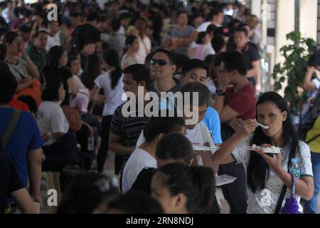 (151031) -- QUEZON CITY, Oct. 31, 2015 -- People line up to file their application for voter s registration for the coming 2016 national elections in Quezon City, the Philippines, Oct. 31, 2015. A petition for the extension of Oct. 31 deadline for the nationwide registration of voters for the 2016 elections was filed at the Philippine Supreme Court as millions of Filipinos were trying to beat the cut-off date on various Commission on Elections (Comelec) registration centers around the country. ) PHILIPPINES-QUEZON CITY-VOTERS REGISTRATION DEADLINE RouellexUmali PUBLICATIONxNOTxINxCHN   Quezon Stock Photo