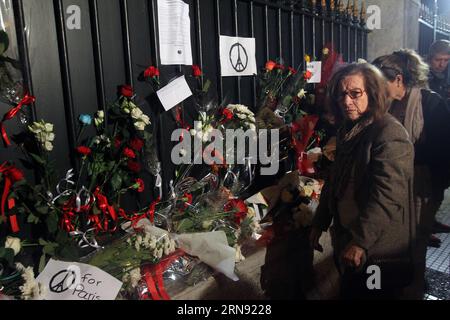 (151114) -- ATHENS, Nov. 14, 2015 -- People place flowers in front of the Embassy of France in Athens, Greece, on Nov. 14, 2015 to pay homage to victims of a series of attacks that happened in Paris on Friday night. ) GREECE-ATHENS-PARIS-ATTACKS-CONDOLENCE MariosxLolos PUBLICATIONxNOTxINxCHN   151114 Athens Nov 14 2015 Celebrities Place Flowers in Front of The Embassy of France in Athens Greece ON Nov 14 2015 to Pay Homage to Victims of a Series of Attacks Thatcher happened in Paris ON Friday Night Greece Athens Paris Attacks condolence MariosxLolos PUBLICATIONxNOTxINxCHN Stock Photo