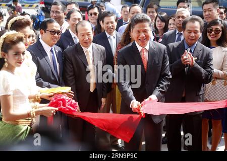 (151215) -- PHNOM PENH, Dec. 15, 2015 -- Cambodian Commerce Minister Sun Chanthol (front) cuts the ribbon to open an annual trade expo in Phnom Penh, Cambodia, Dec. 15, 2015. The 10th Cambodia Import-Export and One Province One Product Exhibition kicked off here on Tuesday, aiming to boost trade and investment, Commerce Minister Sun Chanthol said. ) CAMBODIA-PHNOM PENH-TRADE EXHIBITION Phearum PUBLICATIONxNOTxINxCHN   151215 Phnom Penh DEC 15 2015 Cambodian Commerce Ministers Sun  Front cuts The Ribbon to Open to Annual Trade EXPO in Phnom Penh Cambodia DEC 15 2015 The 10th Cambodia Import Exp Stock Photo