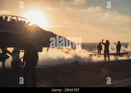 Pacific Ocean. 26th Aug, 2023. An F/A-18F Super Hornet from the Fighting Redcocks of Strike Fighter Squadron (VFA) 22 prepares to launch from the flight deck of the aircraft carrier USS Nimitz (CVN 68). Nimitz is underway conducting routine operations. Credit: U.S. Navy/ZUMA Press Wire/ZUMAPRESS.com/Alamy Live News Stock Photo