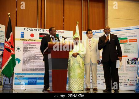 (160131) -- ADDIS ABEBA, 31 gennaio 2016 -- il presidente keniota Uhuru Kenyatta (1st L), Nkosazana Dlamini-Zuma (2nd L), presidente della Commissione dell'UA, e Katsuyuki Kawai (2nd R), il rappresentante speciale del primo ministro del Giappone al Summit dell'UA, partecipano a una conferenza stampa ad Addis Abeba, capitale dell'Etiopia, il 31 gennaio 2016. La sesta Conferenza internazionale di Tokyo sullo sviluppo africano (TICAD) si terrà in Kenya dal 27 al 28 agosto, il presidente Uhuru Kenyatta ha annunciato domenica a margine del vertice dei capi di Stato dell'UA ad Addis Abeba . ) ETIOPIA-ADDIS ABEBA-KENYA-GIAPPONE-TICAD Foto Stock