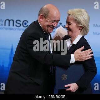 German Defense Minister Ursula von der Leyen (R) and French Defense Minister Jean Yves Le Drian react during the 52nd Munich Security Conference (MSC) in Munich, Germany, on Feb. 12, 2016. Top security and defense officials gathered in Munich for an annual security forum on Friday, focusing on Syrian conflicts, refugees, terrorism and other boundless crises. ) GERMANY-MUNICH-SECURITY-CONFERENCE LuoxHuanhuan PUBLICATIONxNOTxINxCHN   German Defense Ministers Ursula from the Leyen r and French Defense Ministers Jean Yves Le Drian react during The 52nd Munich Security Conference MSC in Munich Germ Stock Photo