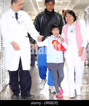 (160215) -- TAINAN, Feb. 15, 2016 -- The eight-year-old survivor Lin Su-Chin (C, front) leaves hospital after receiving medical treatments in Tainan, southeast China s Taiwan, Feb. 15, 2016. The 6.7-magnitude quake hit Kaohsiung on Feb. 6, leaving 116 dead, over 550 injured and huge property losses. (mcg) CHINA-TAINAN-QUAKE-SURVIVOR (CN) photomall PUBLICATIONxNOTxINxCHN   Tainan Feb 15 2016 The Eight Year Old Survivor Lin SU Chin C Front Leaves Hospital After receiving Medical treatments in Tainan South East China S TAIWAN Feb 15 2016 The 6 7 magnitude Quake Hit Kaohsiung ON Feb 6 leaving 116 Stock Photo