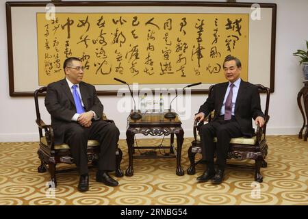 (160305) -- BEIJING, March 5, 2016 () -- Chinese Foreign Minister Wang Yi (R) meets with Chui Sai On, chief executive of Macao Special Administrative Region, in Beijing, capital of China, March 4, 2016. ()(ry) CHINA-BEIJING-WANG YI-CHUI SAI ON-MEETING (CN) Xinhua PUBLICATIONxNOTxINxCHN   Beijing March 5 2016 Chinese Foreign Ministers Wang Yi r Meets With Chui Sai ON Chief Executive of Macao Special Administrative Region in Beijing Capital of China March 4 2016 Ry China Beijing Wang Yi Chui Sai ON Meeting CN XINHUA PUBLICATIONxNOTxINxCHN Stock Photo