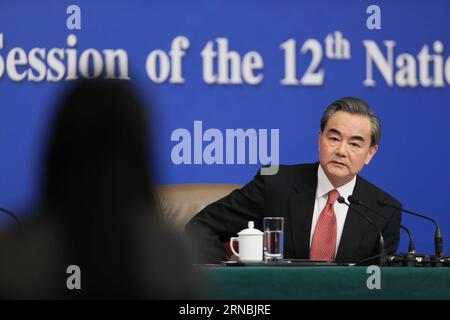 (160308) -- BEIJING, March 8, 2016 -- Chinese Foreign Minister Wang Yi listens to questions at a press conference on the sidelines of the fourth session of China s 12th National People s Congress in Beijing, capital of China, March 8, 2016. Wang talked about China s foreign policy on international and regional issues. )(mcg) (TWO SESSIONS)CHINA-BEIJING-NPC-PRESS CONFERENCE-WANG YI (CN) ChenxJunqing PUBLICATIONxNOTxINxCHN   Beijing March 8 2016 Chinese Foreign Ministers Wang Yi listens to Questions AT a Press Conference ON The Sideline of The Fourth Session of China S 12th National Celebrities Stock Photo