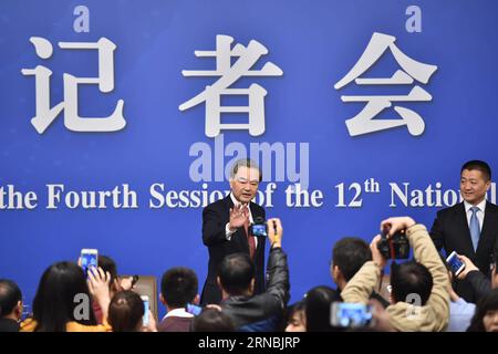 (160308) -- BEIJING, March 8, 2016 -- Chinese Foreign Minister Wang Yi waves to journalists after a press conference on China s foreign policy and foreign relations on the sidelines of the fourth session of China s 12th National People s Congress in Beijing, capital of China, March 8, 2016. ) (TWO SESSIONS)CHINA-BEIJING-NPC-PRESS CONFERENCE-WANG YI (CN) LixXin PUBLICATIONxNOTxINxCHN   Beijing March 8 2016 Chinese Foreign Ministers Wang Yi Waves to Journalists After a Press Conference ON China S Foreign Policy and Foreign relations ON The Sideline of The Fourth Session of China S 12th National Stock Photo