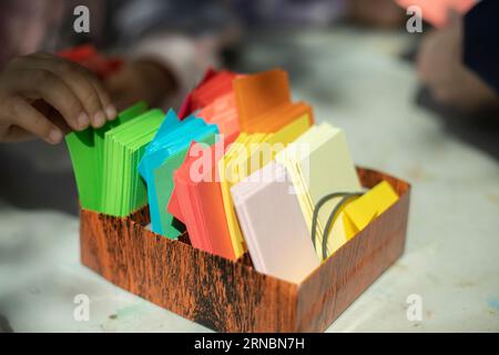 Colored paper. Paper. Pieces of cardboard. Stock Photo