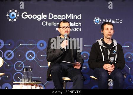 (160315) -- SEOUL, March 15, 2016 -- Demis Hassabis(L), the CEO of Google s London-based AI company DeepMind answers questions during a press conference after South Korean professional Go player Lee Sedol finished the final match of the Google DeepMind Challenge Match against Google s artificial intelligence program, AlphaGo, in Seoul, South Korea, March 15, 2016. Google s Go-playing computer program again defeated its human opponent in a final match on Tuesday that sealed its 4-1 victory. ) (SP)SOUTH KOREA-GO-LEE SEDOL VS ALPHAGO-FIFTH ROUND YaoxQilin PUBLICATIONxNOTxINxCHN   Seoul March 15 2 Stock Photo