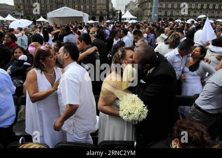 (160320) -- MEXICO CITY, March 20, 2016 -- Couples kiss during the celebration of the Collective Weddings 2016, organized by Government of Mexico City, at Zocalo Square, in Mexico City, capital of Mexico, on March 19, 2016. According to local press, about 2,000 couples got married during the Collective Weddings 2016. Str) (jp) (fnc) MEXICO-MEXICO CITY-SOCIETY-WEDDING e Str PUBLICATIONxNOTxINxCHN   Mexico City March 20 2016 Couples Kiss during The Celebration of The Collective weddings 2016 Organized by Government of Mexico City AT Zocalo Square in Mexico City Capital of Mexico ON March 19 2016 Stock Photo