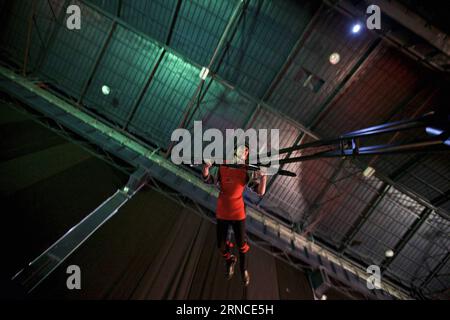 Carsten Höller Ausstellung in Mailand MILAN, April 6, 2016 -- A visitor experiences an artwork Two Flying Machines , part of the exhibition Doubt in Milan, Italy, on April 6, 2016. The exhibition Doubt created by the German artist Carsten Holler kicked off on Wednesday in Milan. ) ITALY-MILAN-ART-EXHIBITION JinxYu PUBLICATIONxNOTxINxCHN   Carsten Höller Exhibition in Milan Milan April 6 2016 a Visitor Experiences to Artwork Two Flying Machines Part of The Exhibition Doubt in Milan Italy ON April 6 2016 The Exhibition Doubt Created by The German Artist Carsten Holler kicked off ON Wednesday in Stock Photo