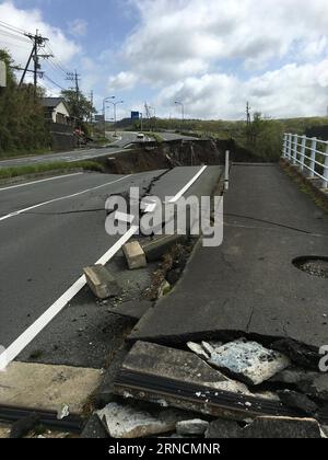 Schäden nach den schweren Erdbeben in Japan (160417) -- KUMAMOTO, April 17, 2016 -- Photo taken on April 17, 2016 shows a road destroyed by earthquake in Kumamoto prefecture in southwest Japan. A powerful magnitude-7.3 earthquake struck the island of Kyushu in southwest Japan early Saturday just a day after a sizable foreshock hit the region, with the number of fatalities now standing at 41 according to the latest figures on Sunday. ) JAPAN-KUMAMOTO-EARTHQUAKE-AFTERMATH HuaxYi PUBLICATIONxNOTxINxCHN   Damage after the serious Earthquakes in Japan 160417 Kumamoto April 17 2016 Photo Taken ON Ap Stock Photo