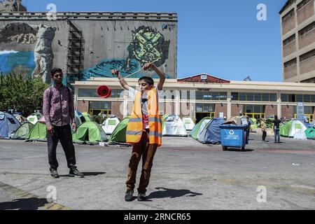 (160419) -- PIRAEUS, April 19, 2016 -- Photo taken on April 15, 2016 shows a Syrian boy playing at the Passenger Terminal E2 where thousands of refugee families are stranded, in Piraeus, Greece. Passenger terminals at the port of Piraeus, the main gateway to the Aegean Sea islands, have turned into temporary unofficial camps sheltering more than 3,700 refugees and migrants over the past two months. With summer s tourism season on the horizon, the Greek government has stepped up its efforts to evacuate migrants from Greece s largest port by early May and transfer them to organized reception cen Stock Photo