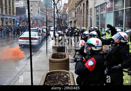 MONTREAL, May 1, 2016 -- Policemen stand guard during an anti-capitalist protest in downtown Montreal, Canada, on May 1, 2016. Several hundred demonstrators take part in the protest on Sunday. Kadrid Mohamed) CANADA-MONTREAL-LABOR DAY-PROTEST libaodong PUBLICATIONxNOTxINxCHN   Montreal May 1 2016 Policemen stand Guard during to Anti Capitalist Protest in Downtown Montreal Canada ON May 1 2016 several Hundred demonstrator Take Part in The Protest ON Sunday  Mohamed Canada Montreal Laboratory Day Protest libaodong PUBLICATIONxNOTxINxCHN Stock Photo