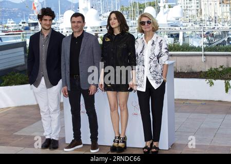 (160515) -- CANNES, May 15, 2016 -- Director Nicole Garcia poses with cast members Marion Cotillard, Alex Brendemuhl and Louis Garrel (from R to L) during a photocall for the film Mal de Pierres (From the Land of the Moon) in competition at the 69th Cannes Film Festival in Cannes, France, May 15, 2016. ) FRANCE-CANNES-FILM FESTIVAL-MAL DE PIERRES-PHOTO CALL JinxYu PUBLICATIONxNOTxINxCHN   160515 Cannes May 15 2016 Director Nicole Garcia Poses With Cast Members Marion Cotillard Alex Brendemuhl and Louis Garrel from r to l during a photo call for The Film times de Pierres from The Country of The Stock Photo