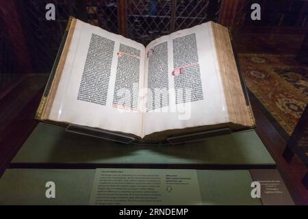 160518 -- NEW YORK, May 17, 2016 -- Photo taken on May 17, 2016 shows the Gutenberg Bible inside the Morgan Library and Museum in New York, the United States. The Morgan Library & Museum, formerly the Pierpont Morgan Library, is a museum and research library located on 225 Madison Avenue, East 36th Street, in the Murray Hill neighbourhood of Manhattan, New York City. It was founded to house the private library of J. P. Morgan in 1906, which included manuscripts and printed books, some of them in rare bindings, as well as his collection of prints and drawings. The library was designed by Charle Stock Photo