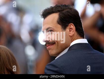 (160521) -- CANNES, May 21, 2016 -- French actor Laurent Lafitte poses on May 21, 2016 during a photocall for the film Elle at the 69th Cannes Film Festival in Cannes, southern France. ) FRANCE-CANNES-FILM FESTIVAL-ELLE-PHOTO CALL JinxYu PUBLICATIONxNOTxINxCHN   160521 Cannes May 21 2016 French Actor Laurent Lafitte Poses ON May 21 2016 during a photo call for The Film Elle AT The 69th Cannes Film Festival in Cannes Southern France France Cannes Film Festival Elle Photo Call JinxYu PUBLICATIONxNOTxINxCHN Stock Photo