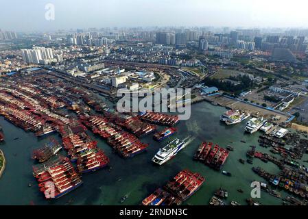 NANNING, May -- Photo taken on May 18, 2016 shows the Dianjian fishing port and the international port in Beihai City, south China s Guangxi Zhuang Autonomous Region. Established in 2006, the Beibu Gulf Economic Zone comprises six cities: Nanning, Beihai, Qinzhou, Fangchenggang, Yulin and Chongzuo. After ten years of development, the total output value of Nanning, Beihai, Qinzhou and Fangchenggang has risen to 586.7 billion yuan (about 89.47 billion US dollars)in 2015 and the total value for import and export has increased to 24.1 billion US dollars. ) (zwx) CHINA-GUANGXI-BEIBU GULF ECONOMIC Z Stock Photo