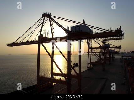 NANNING, May -- Photo taken on May 17, 2016 shows a dock at the bonded port area of Qinzhou, south China s Guangxi Zhuang Autonomous Region. Established in 2006, the Beibu Gulf Economic Zone comprises six cities: Nanning, Beihai, Qinzhou, Fangchenggang, Yulin and Chongzuo. After ten years of development, the total output value of Nanning, Beihai, Qinzhou and Fangchenggang has risen to 586.7 billion yuan (about 89.47 billion US dollars)in 2015 and the total value for import and export has increased to 24.1 billion US dollars. ) (zwx) CHINA-GUANGXI-BEIBU GULF ECONOMIC ZONE(CN) ZhangxAilin PUBLIC Stock Photo