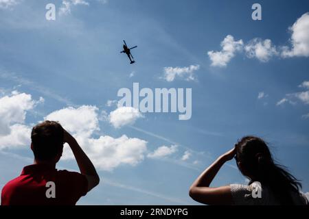 (160604) -- BERLIN, June 3, 2016 -- People view the performance of an AH-64 Apache attack helicopter during the 2016 ILA Berlin Air Show in Berlin, Germany, on June 3, 2016. The 4-day ILA exhibition kicked off on Wednesday with the participation of 1,017 exhibitors from 37 countries and regions. ) GERMANY-BERLIN-AIR SHOW ZhangxFan PUBLICATIONxNOTxINxCHN   160604 Berlin June 3 2016 Celebrities View The Performance of to AH 64 Apache Attack Helicopter during The 2016 ILA Berlin Air Show in Berlin Germany ON June 3 2016 The 4 Day ILA Exhibition kicked off ON Wednesday With The participation of 1 Stock Photo