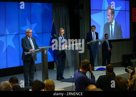 (160629) -- BRUSSELS, June 29, 2016 -- European Council President Donald Tusk (C) and European Commission President Jean-Claude Juncker (L) attend a press conference at the EU headquarters in Brussels, Belgium, June 29, 2016. European Council President Donald Tusk said on Wednesday that leaders of the 27 non-UK European Union countries have agreed that they would not grant Britain access to the block s single market if Britain did not accept EU s rules on free movement. ) BELGIUM-BRUSSELS-EU-SUMMIT GongxBing PUBLICATIONxNOTxINxCHN   160629 Brussels June 29 2016 European Council President Donal Stock Photo