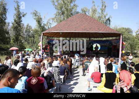 (160825) -- BISHKEK, Aug. 25, 2016 -- Local residents and government representatives hold a welcome ceremony for the Chinese caravan at their camp on the outskirts of Bishkek, Kyrgyzstan, Aug. 24, 2016. A group of Chinese caravan with 54 camels, 10 horses, 15 vehicles and more than 50 people entered Kyrgyzstan on Aug. 22 to continue their Silk Road culture tour. ) (zw) KYRGYZSTAN-BISHKEK-CHINESE CARAVAN-SILK ROAD RomanxGainanov PUBLICATIONxNOTxINxCHN   160825 Bishkek Aug 25 2016 Local Residents and Government Representatives Hold a Welcome Ceremony for The Chinese Caravan AT their Camp ON The Stock Photo