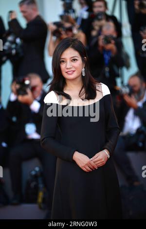 Filmfestspiele Venedig - Eröffnungszeremonie (160831) -- VENICE, Aug. 31, 2016 -- Chinese actress and member of the jury Zhao Wei arrives at the red carpet to attend the opening ceremony of the 73rd Venice Film Festival in Venice, Italy, Aug. 31, 2016. ) ITALY-VENICE-FILM FESTIVAL-OPEN JinxYu PUBLICATIONxNOTxINxCHN   Film Festival Venice Opening ceremony 160831 Venice Aug 31 2016 Chinese actress and member of The Jury Zhao Wei arrives AT The Red Carpet to attend The Opening Ceremony of The 73rd Venice Film Festival in Venice Italy Aug 31 2016 Italy Venice Film Festival Open JinxYu PUBLICATIONx Stock Photo